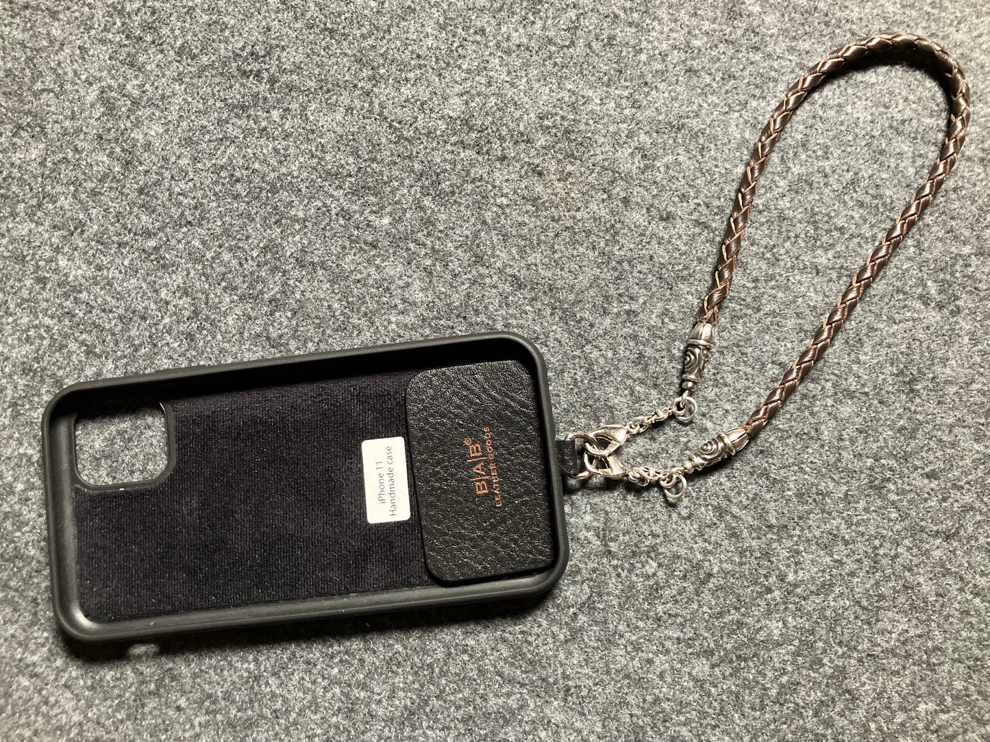 Laser-cut and engraved Full-Grain vegetable-tanned Genuine Leather iPhone Case/Holder/microfiber. 2 Spiral Terminals, 2 Links, and 6 Rings, all made of 925 Sterling Silver & Hand-braided 4-strand Leather Strap/Choker/Bracelet, Brown or Black.- KP22i