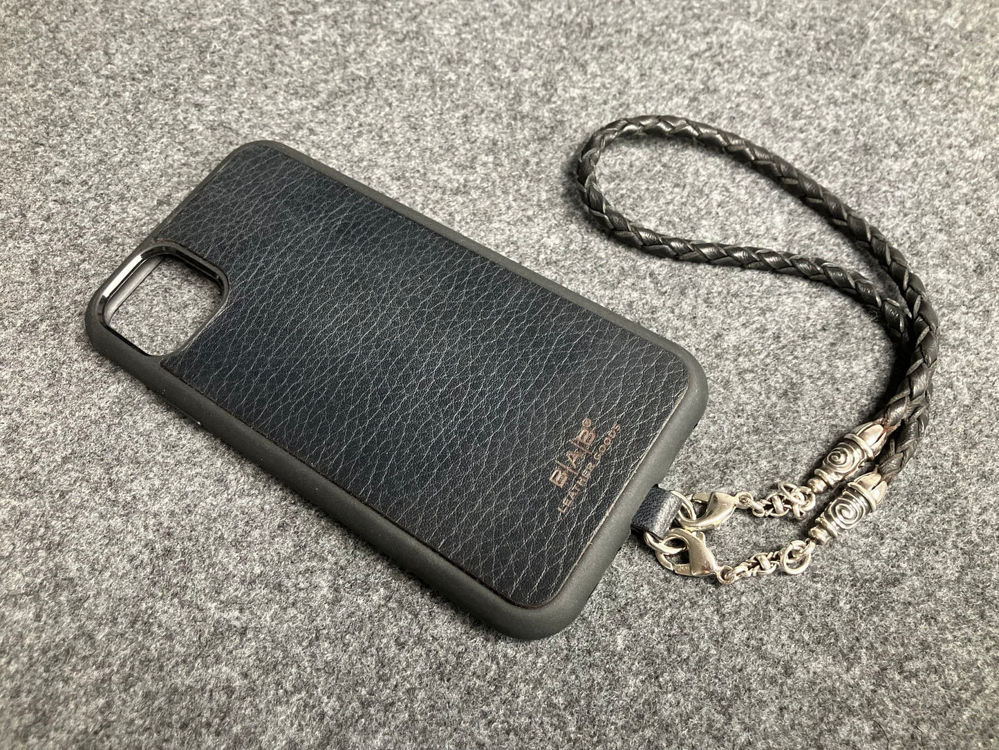 Laser-cut and engraved Full-Grain vegetable-tanned Genuine Leather iPhone Case/Holder/microfiber. 2 Spiral Terminals, 2 Links, and 6 Rings, all made of 925 Sterling Silver & Hand-braided 4-strand Leather Strap/Choker/Bracelet, Brown or Black.- KP22i