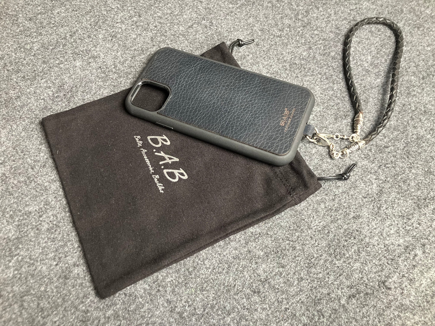 Laser-cut and engraved Full-Grain vegetable-tanned Genuine Leather iPhone Case/Holder/microfiber. 2 Spiral Terminals, 2 Links, and 6 Rings, all made of 925 Sterling Silver & Hand-braided 4-strand Leather Strap/Choker/Bracelet, Brown or Black.- KP22i