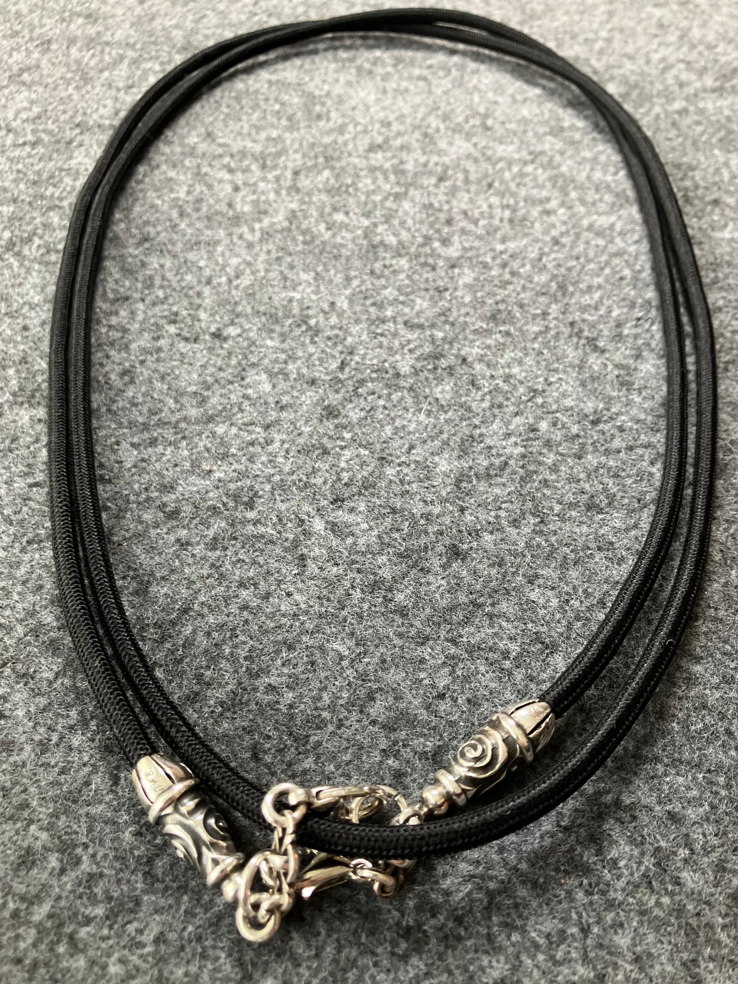 2 Spiral Terminals, 2 Links, and 6 Rings, all made of solid 925 Sterling Silver & Black Elastic Rope Crossbody/Necklace/Choker/Bracelet.- CP11