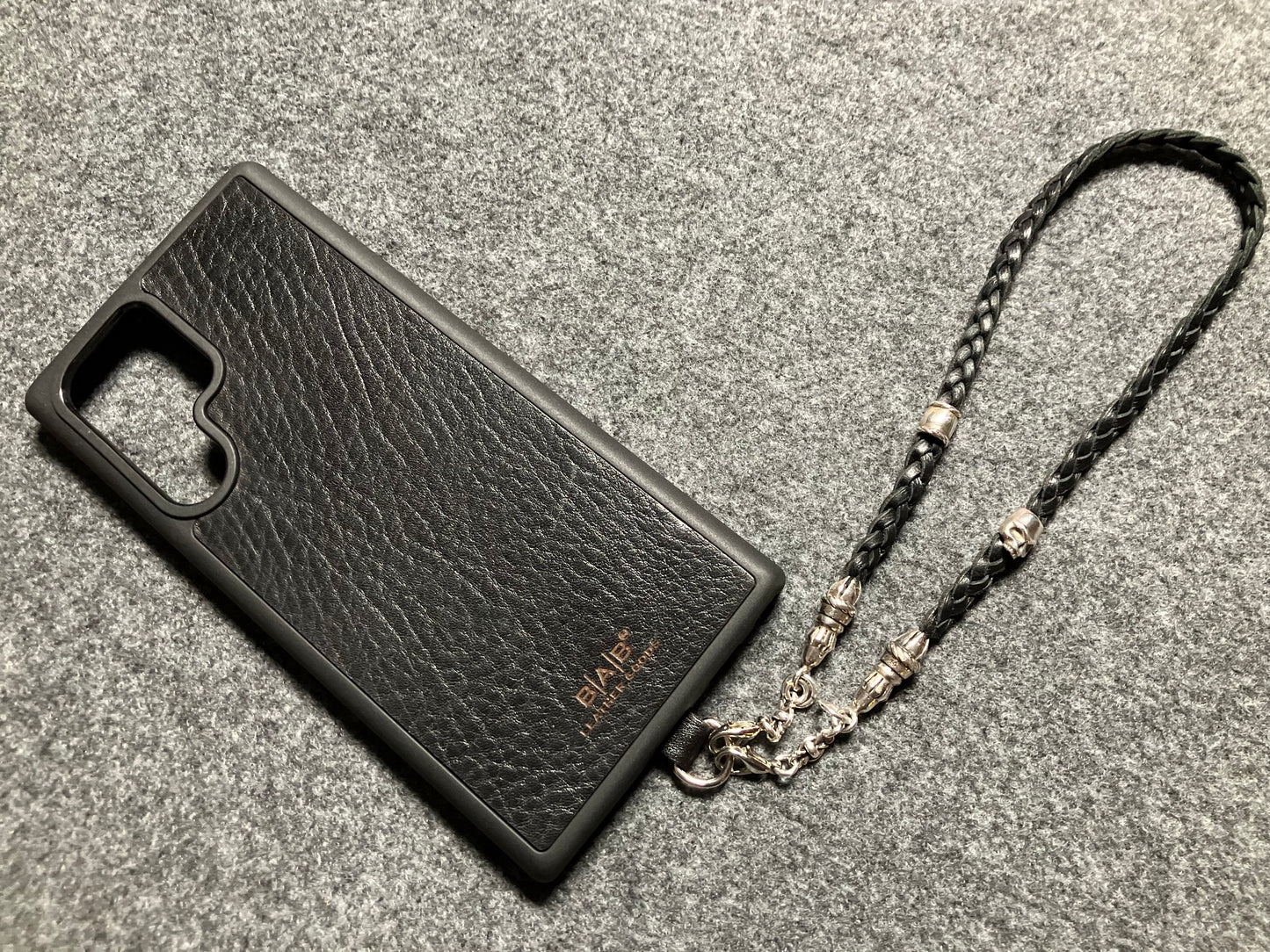 Full-Grain Genuine Leather Laser-cut & engraved Samsung Case/Holder/microfiber & 2 Terminals & 1 Rope Pin, 1 Skull, and 6 Rings, all made of 925 Sterling Silver & Strap/Choker/Bracelet, hand-braided 3-strands Leather, Brown or Black.- KP03S