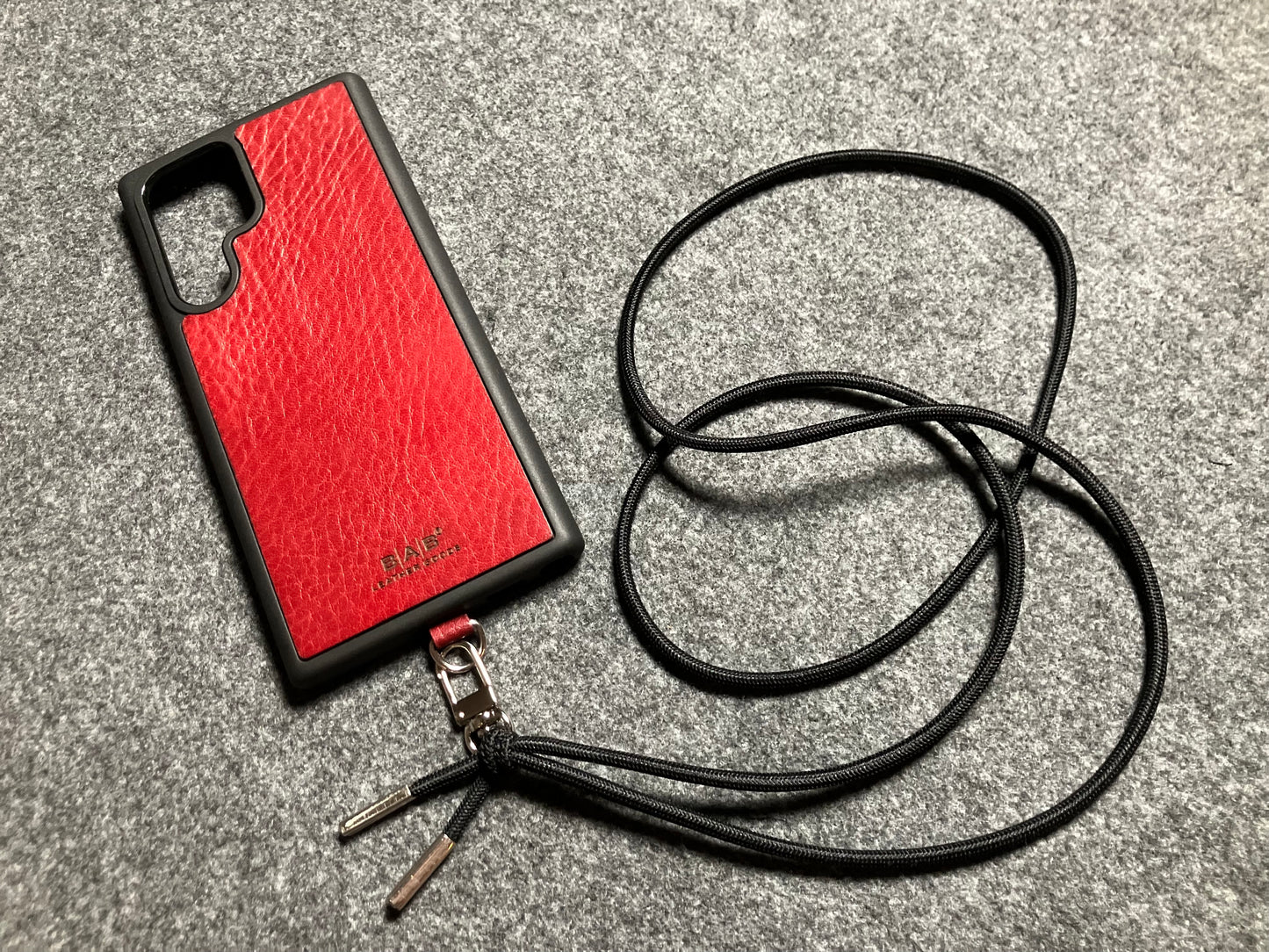 Samsung Case/Holder, Laser Cut & Engraved Full-Grain vegetable-tanned Genuine Leather/microfiber & Black Elastic Rope Crossbody/Necklace/Choker/Bracelet with a Carabiner, and 2 Silver End caps.- KCS53