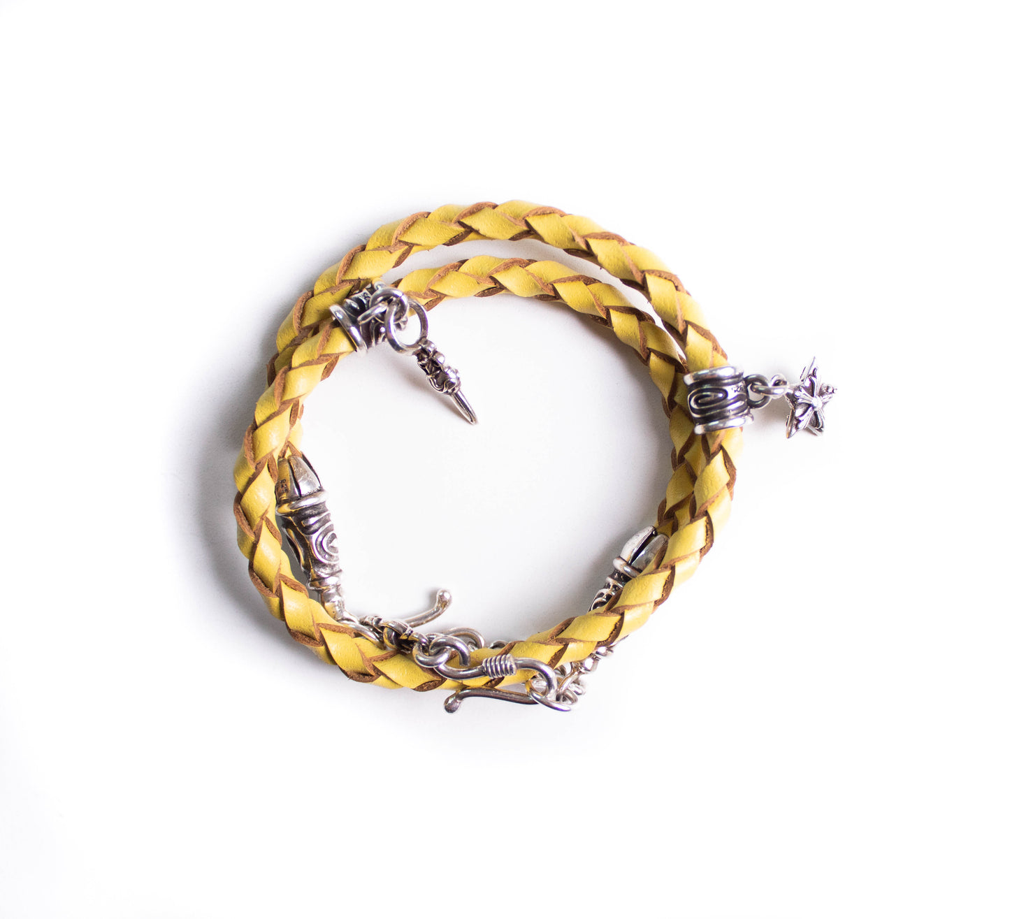 2 Spiral Terminals, 2 Links, 2 S-Clasps, 2 Pendant Pins, and 8 Rings, all made of solid 925 Sterling Silver & Genuine Leather Strap/Choker/Bracelet with 4 hand-braided strands.- PP02