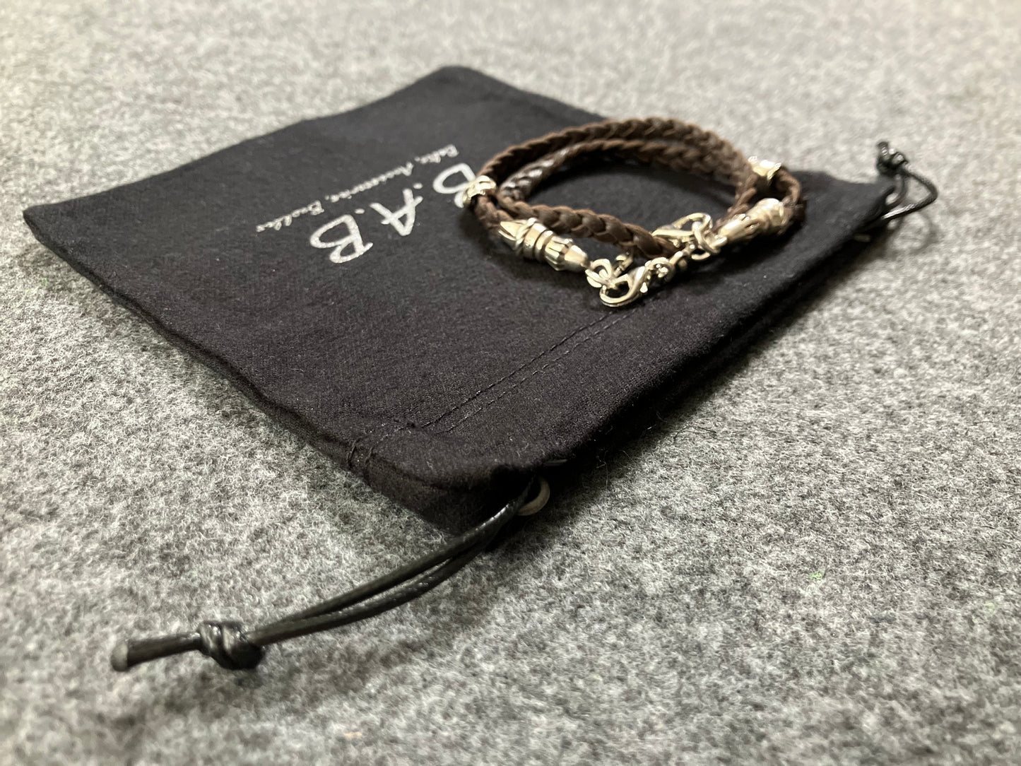Full-Grain Genuine Leather Laser-cut & engraved Samsung Case/Holder/microfiber & 2 Terminals & 1 Rope Pin, 1 Skull, and 6 Rings, all made of 925 Sterling Silver & Strap/Choker/Bracelet, hand-braided 3-strands Leather, Brown or Black.- KP03S