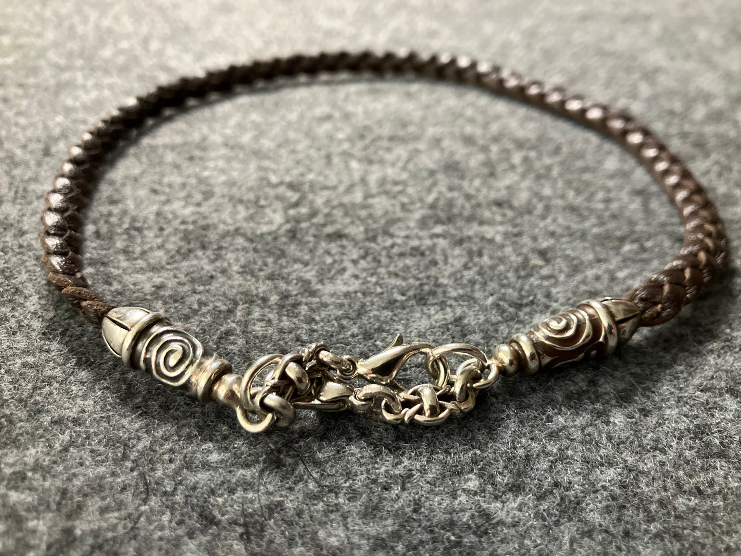 2 Spiral Terminals, 2 Links, and 6 Rings, all made of solid 925 Sterling Silver & Genuine Leather with three hand-braided double strands, Brown, or Black.- PP17