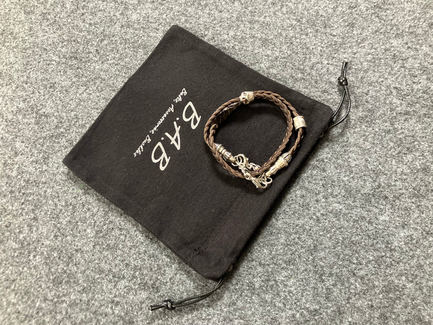 Full-Grain Genuine Leather Laser-cut & engraved Samsung Case/Holder/microfiber & 2 Terminals & 1 Rope Pin, 1 Skull, and 6 Rings, all made of 925 Sterling Silver & Strap/Choker/Bracelet, hand-braided 3-strands Leather, Brown or Black.- KP03S