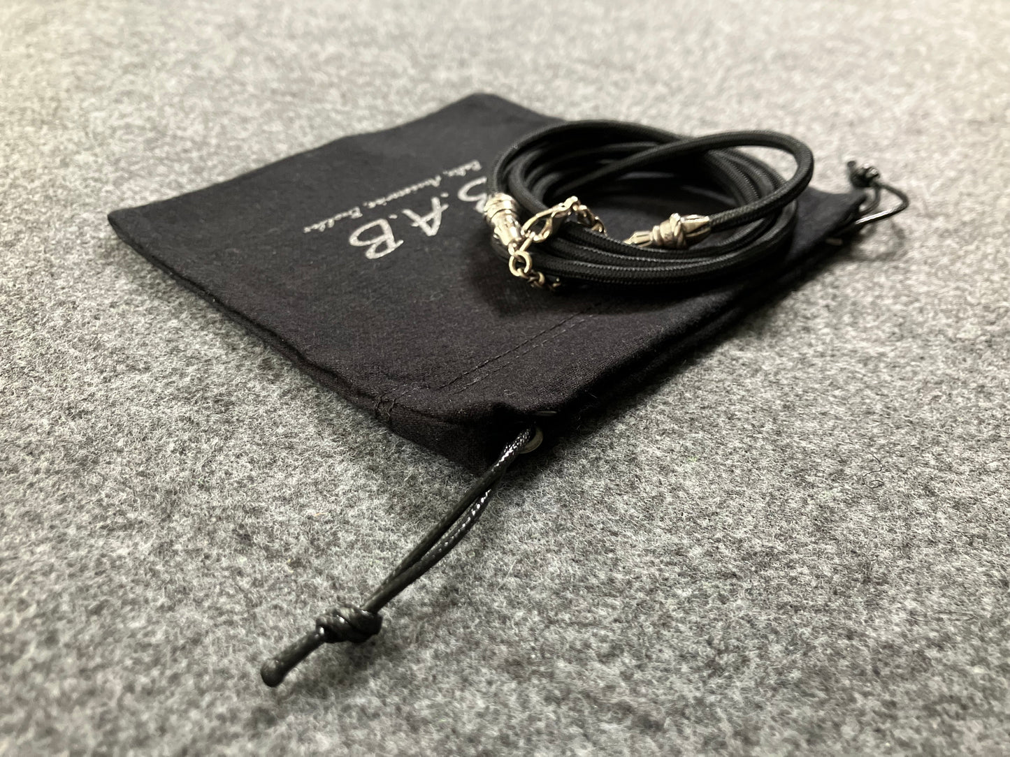 Full-Grain vegetable-tanned Genuine Leather Case/Holder for iPhone/Samsung/microfiber. 2 Rope Terminals, 2 Links, and 6 Rings, all made of 925 Sterling Silver & Crossbody/Necklace/Choker/Bracelet with Black Elastic Rope.- KC29