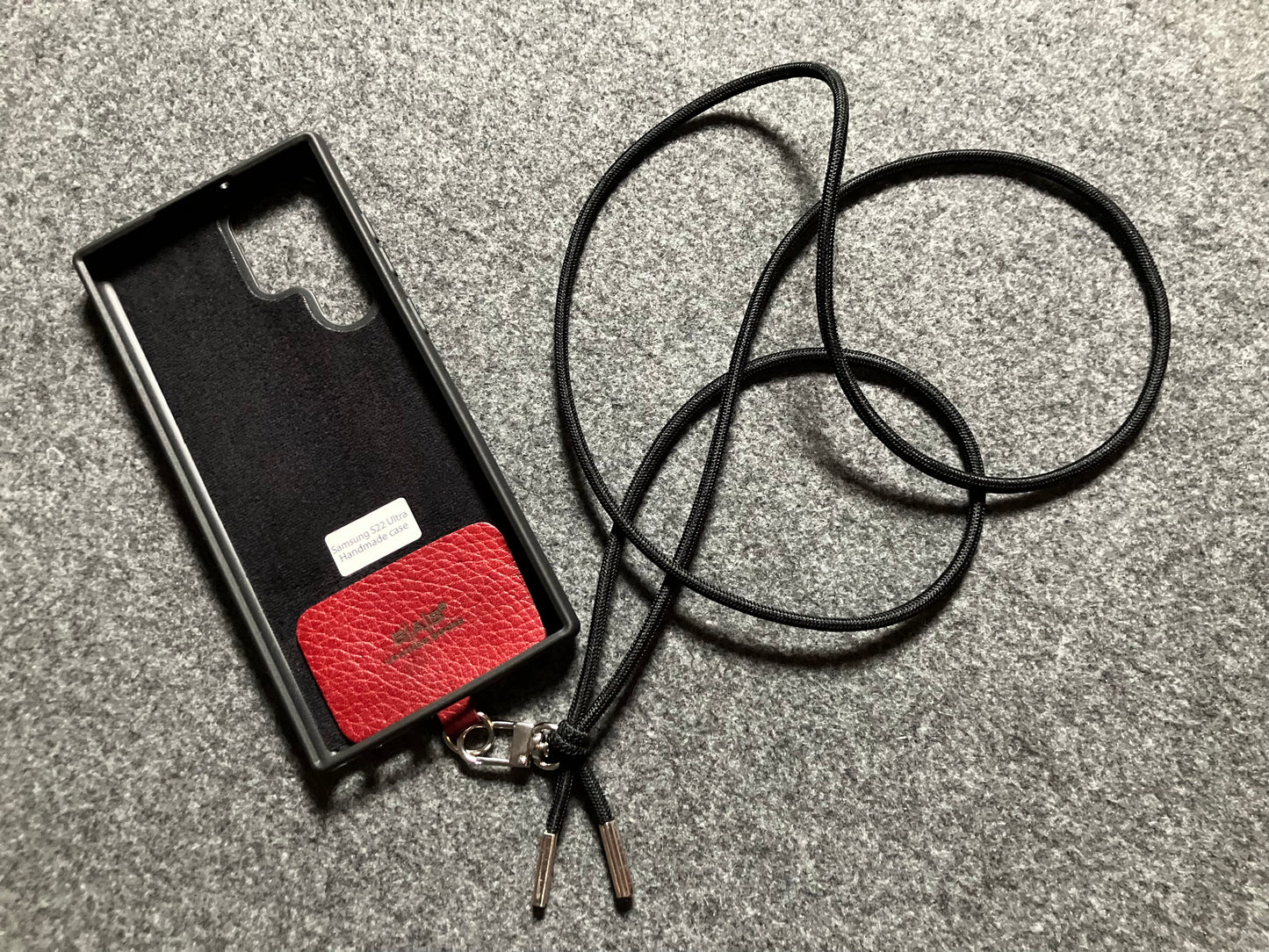 Samsung Case/Holder, Laser Cut & Engraved Full-Grain vegetable-tanned Genuine Leather/microfiber & Black Elastic Rope Crossbody/Necklace/Choker/Bracelet with a Carabiner, and 2 Silver End caps.- KCS53