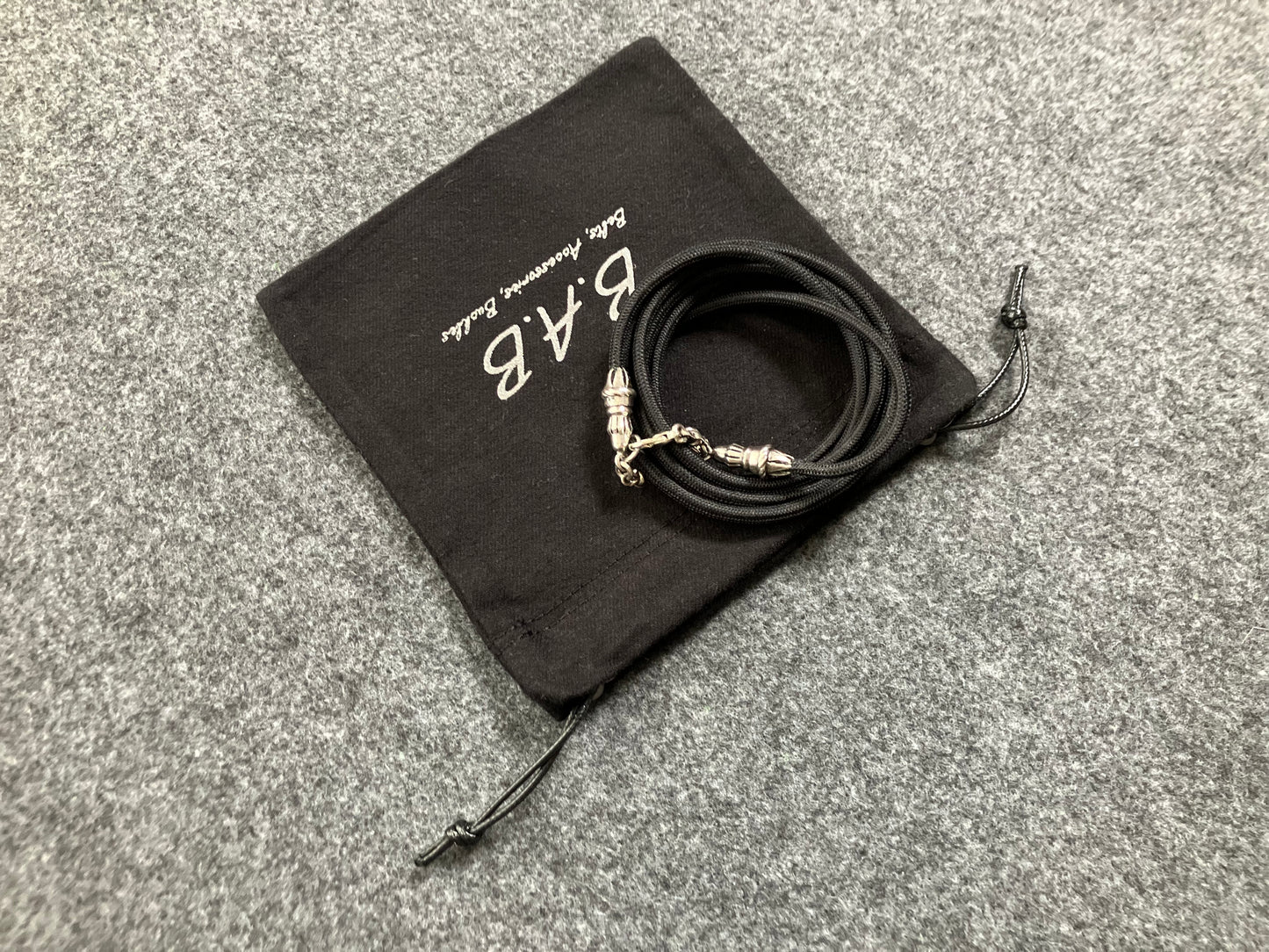 Full-Grain vegetable-tanned Genuine Leather Case/Holder for iPhone/Samsung/microfiber. 2 Rope Terminals, 2 Links, and 6 Rings, all made of 925 Sterling Silver & Crossbody/Necklace/Choker/Bracelet with Black Elastic Rope.- KC29