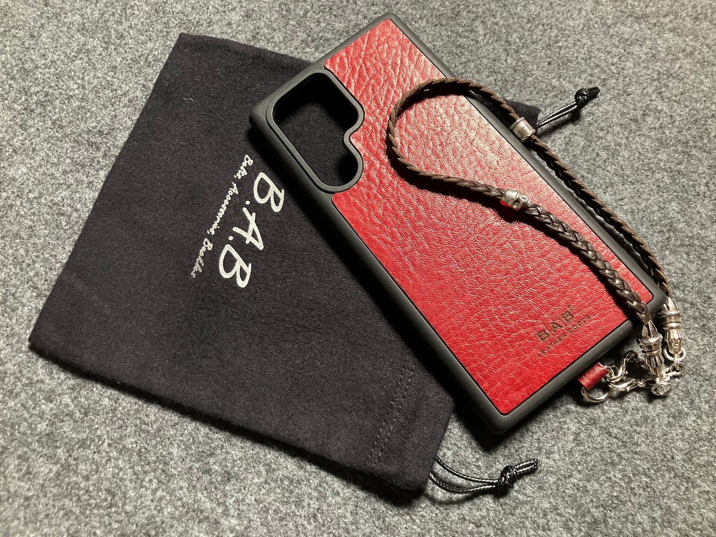 Full-Grain Genuine Leather Laser-cut & engraved Samsung Case/Holder/microfiber & 2 Terminals & 1 Rope Pin, 1 Skull, and 6 Rings, all made of 925 Sterling Silver & Strap/Choker/Bracelet, hand-braided 3-strands Leather, Brown or Black.- KP03S