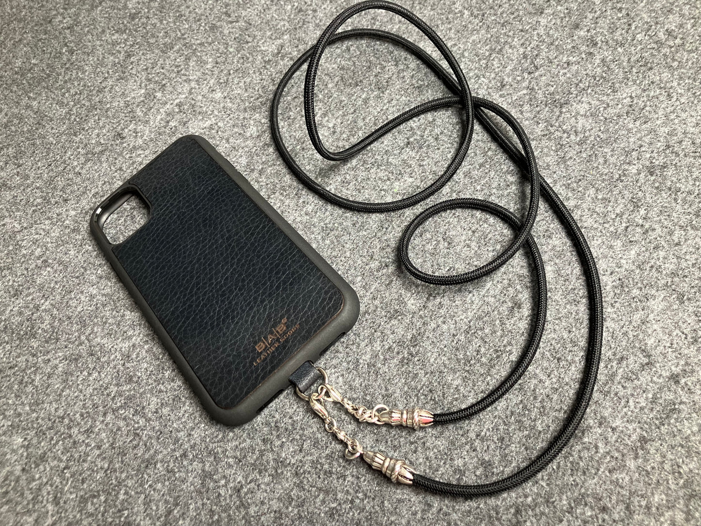 Full-Grain vegetable-tanned Genuine Leather Case/Holder for iPhone/Samsung/microfiber. 2 Rope Terminals, 2 Links, and 6 Rings, all made of 925 Sterling Silver & Crossbody/Necklace/Choker/Bracelet with Black Elastic Rope.- KC29