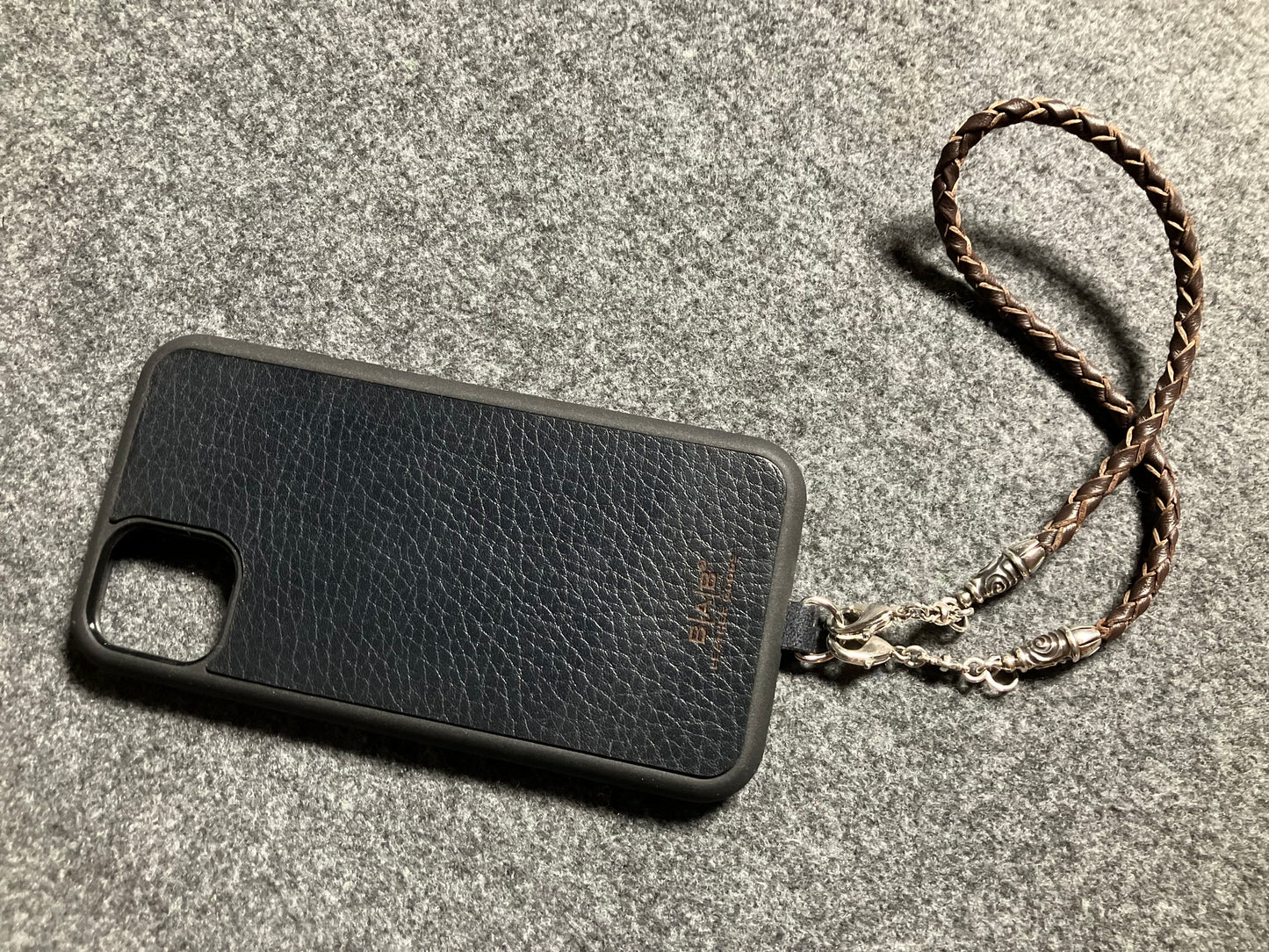 Laser-cut and engraved Full-Grain vegetable-tanned Genuine Leather iPhone Case/Holder/microfiber. 2 Spiral Terminals, 2 Links, and 6 Rings, all made of 925 Sterling Silver & Hand-braided 4-strand Leather Strap/Choker/Bracelet, Brown or Black.- KP22i