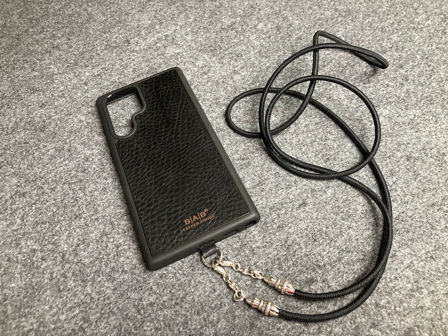 Full-Grain vegetable-tanned Genuine Leather Case/Holder for iPhone/Samsung/microfiber. 2 Rope Terminals, 2 Links, and 6 Rings, all made of 925 Sterling Silver & Crossbody/Necklace/Choker/Bracelet with Black Elastic Rope.- KC29