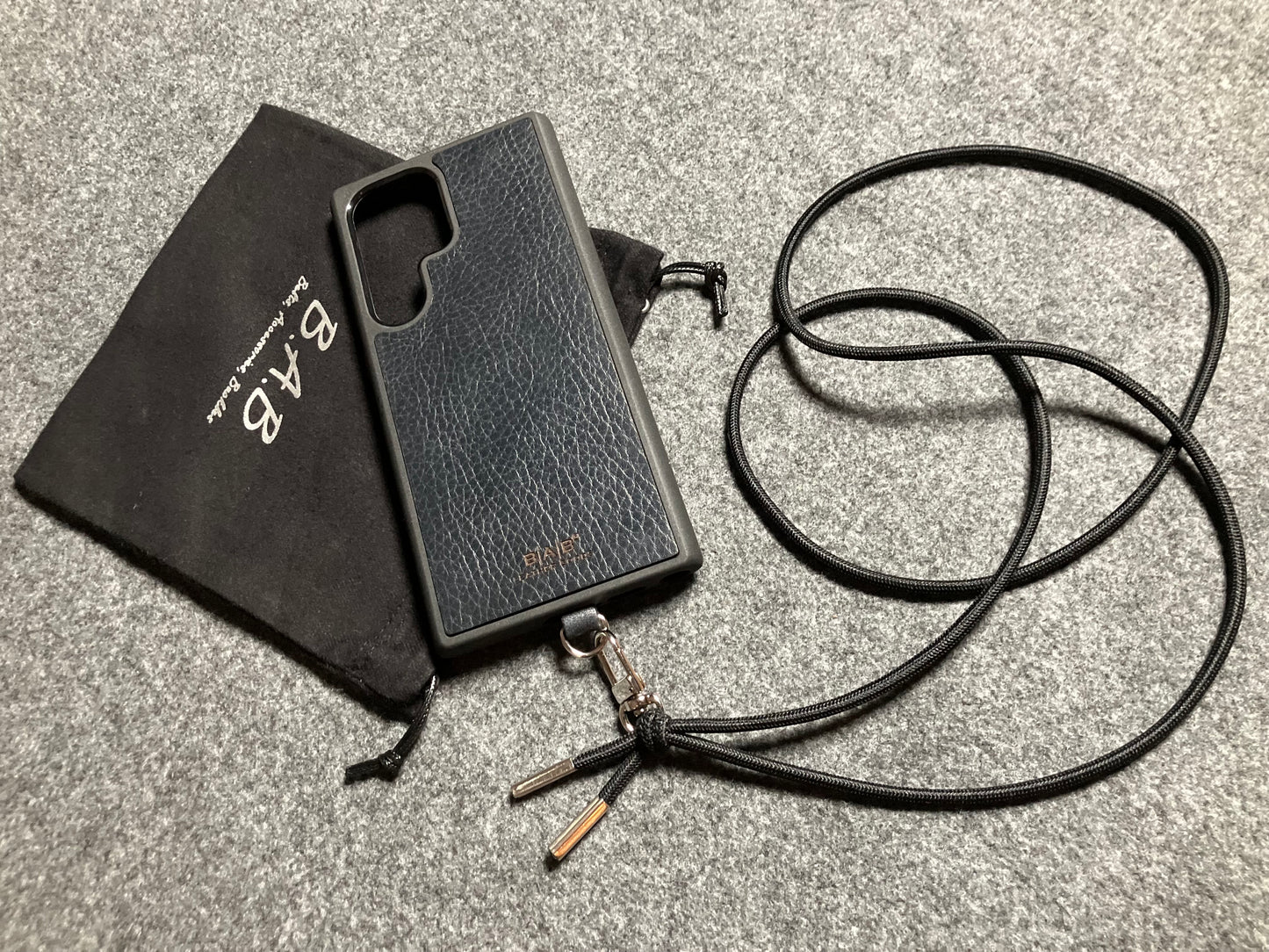 Samsung Case/Holder, Laser Cut & Engraved Full-Grain vegetable-tanned Genuine Leather/microfiber & Black Elastic Rope Crossbody/Necklace/Choker/Bracelet with a Carabiner, and 2 Silver End caps.- KCS53