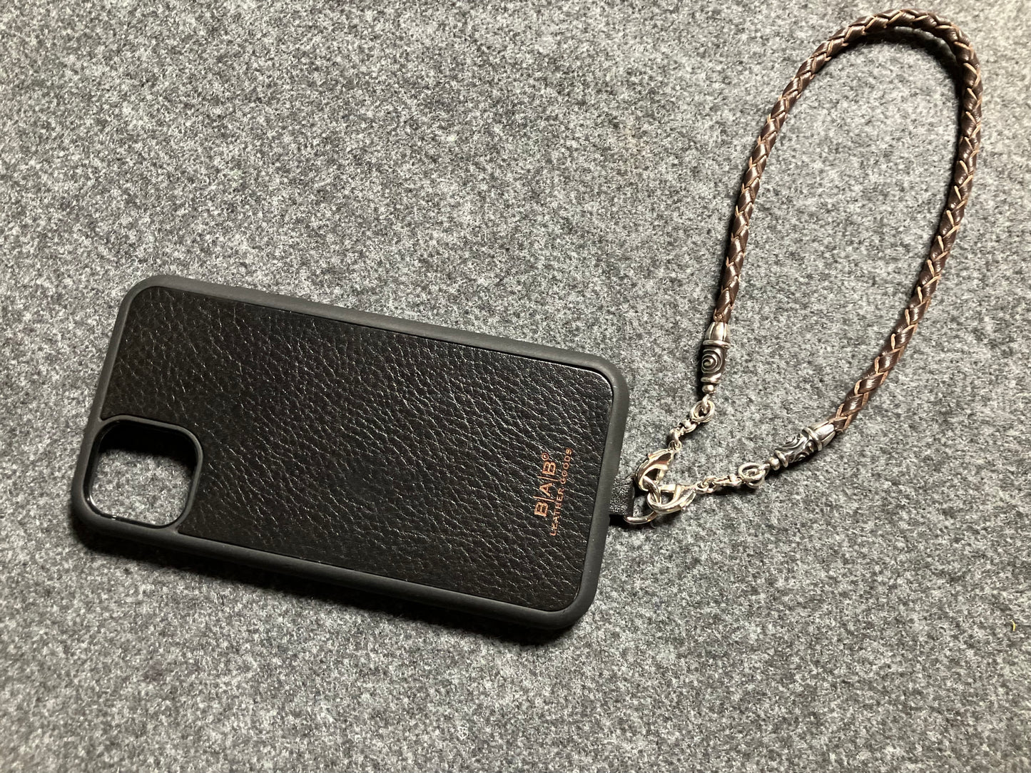 Laser-cut and engraved Full-Grain vegetable-tanned Genuine Leather iPhone Case/Holder/microfiber. 2 Spiral Terminals, 2 Links, and 6 Rings, all made of 925 Sterling Silver & Hand-braided 4-strand Leather Strap/Choker/Bracelet, Brown or Black.- KP22i