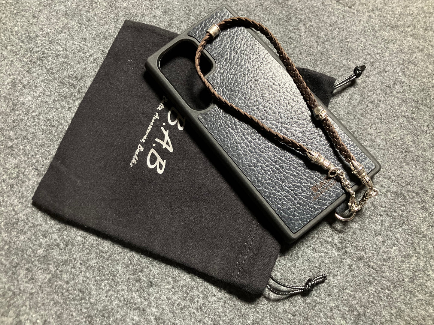 Full-Grain Genuine Leather Laser-cut & engraved Samsung Case/Holder/microfiber & 2 Terminals & 1 Rope Pin, 1 Skull, and 6 Rings, all made of 925 Sterling Silver & Strap/Choker/Bracelet, hand-braided 3-strands Leather, Brown or Black.- KP03S