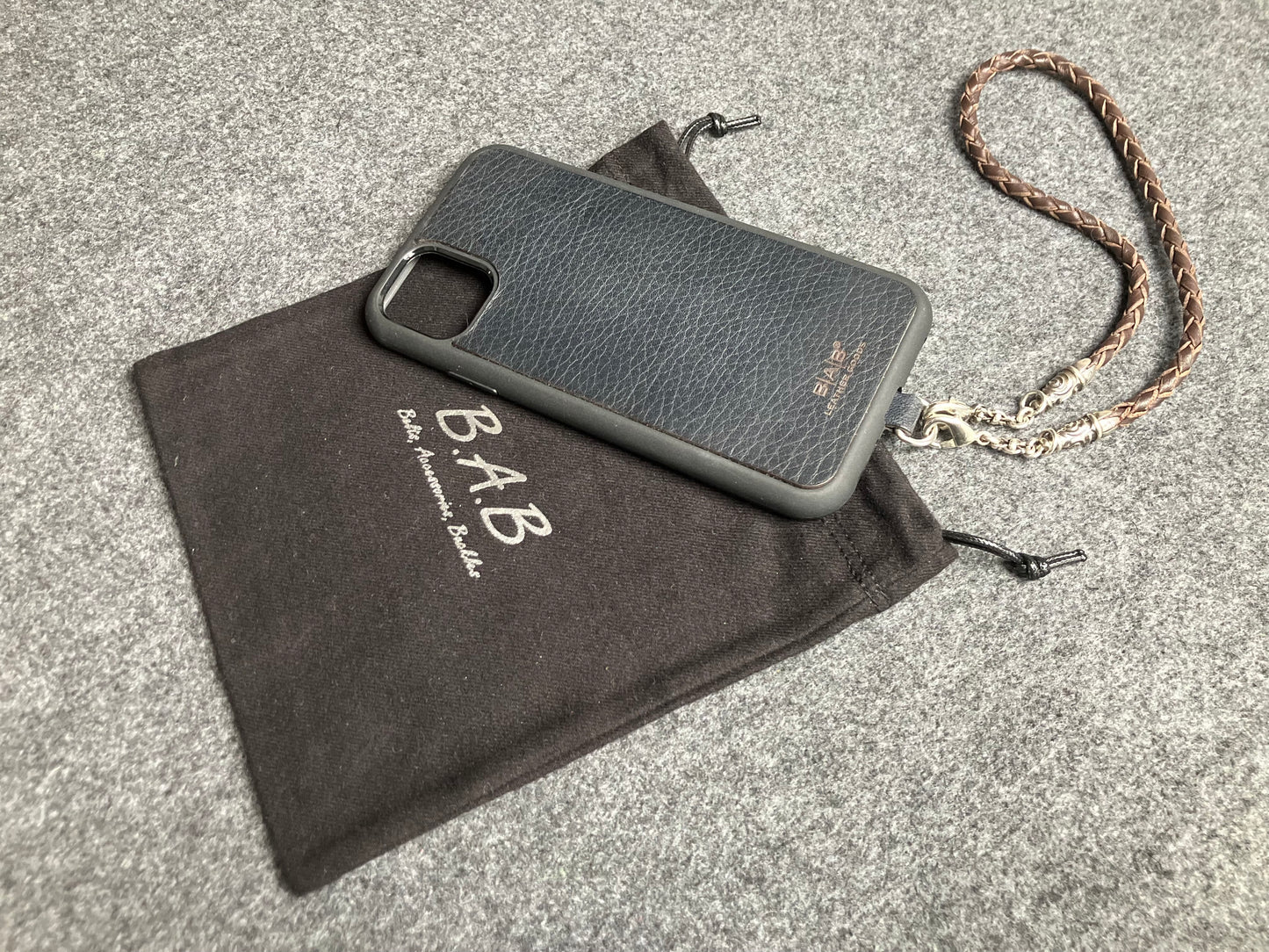 Laser-cut and engraved Full-Grain vegetable-tanned Genuine Leather iPhone Case/Holder/microfiber. 2 Spiral Terminals, 2 Links, and 6 Rings, all made of 925 Sterling Silver & Hand-braided 4-strand Leather Strap/Choker/Bracelet, Brown or Black.- KP22i