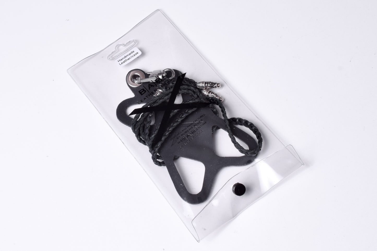 Laser-engraved Silicone cell phone Holder. 2 Spiral Terminals, 1 Spiral Pin with Ring, and 1Star Pendant, all made of solid 925 Sterling Silver & Genuine Leather Crossbody/Necklace/Bracelet with 3 hand-braided strands, Brown, or Black.- SP33