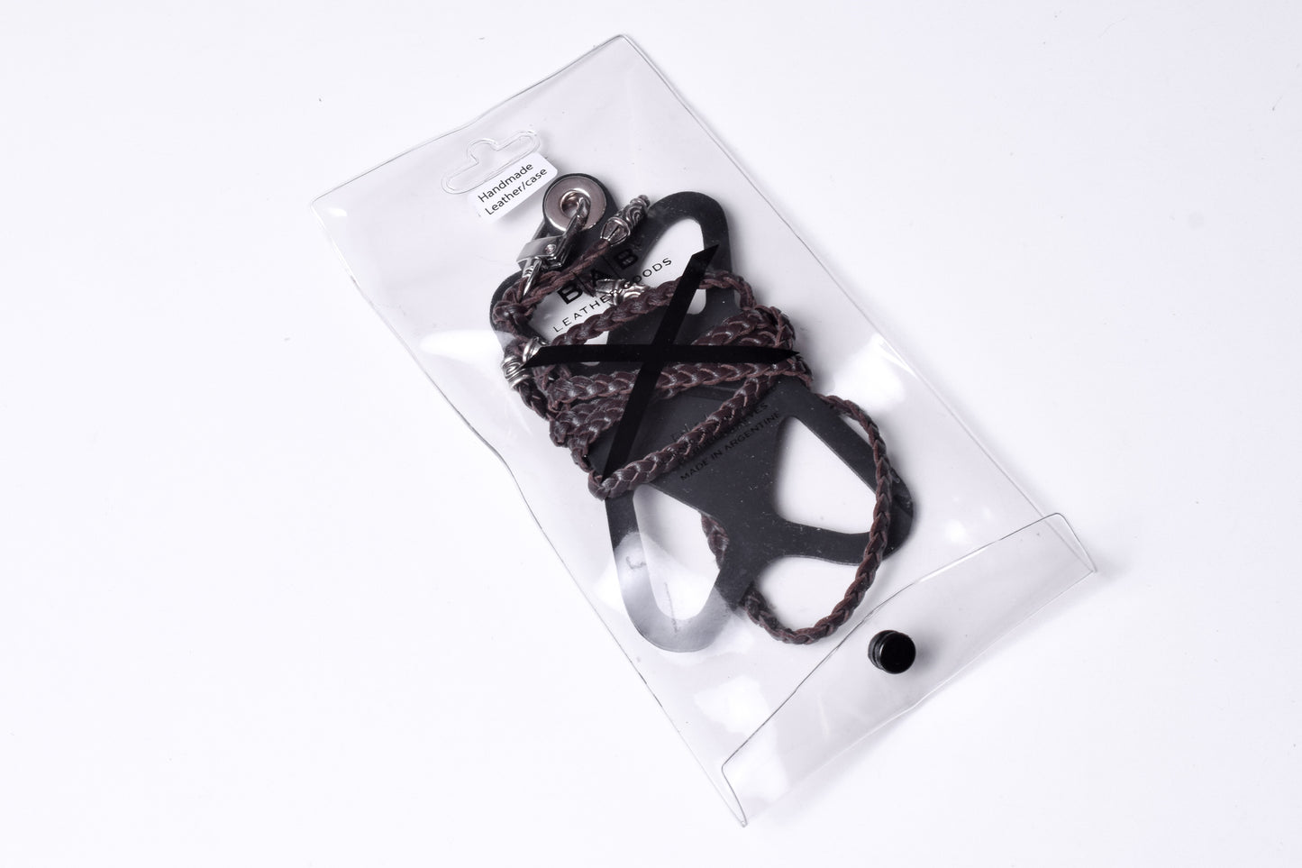 Laser-engraved Silicone cell phone Holder. 2 Spiral Terminals and 2 Spiral Pins, all made of solid 925 Sterling Silver & Genuine Leather Crossbody/Necklace/Bracelet with 3 hand-braided double strands, Brown, or Black.- SP43