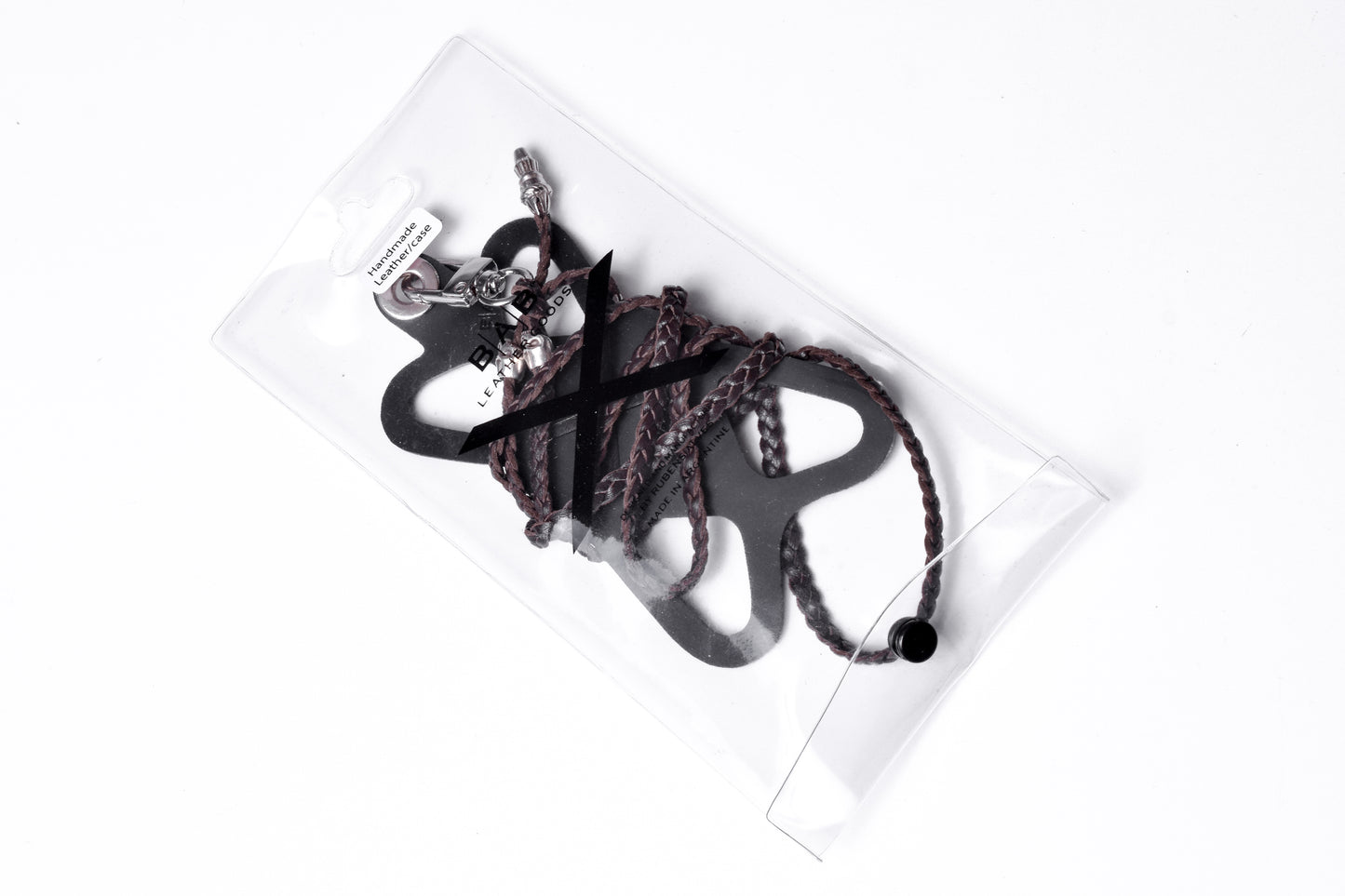 Laser-engraved Silicone cell phone Holder. 2 Skulls and 2 Rope Terminals, all made of solid 925 Sterling Silver & Genuine Leather Crossbody/Necklace/Bracelet with 3 hand-braided double strands, Brown, or Black.- SP30