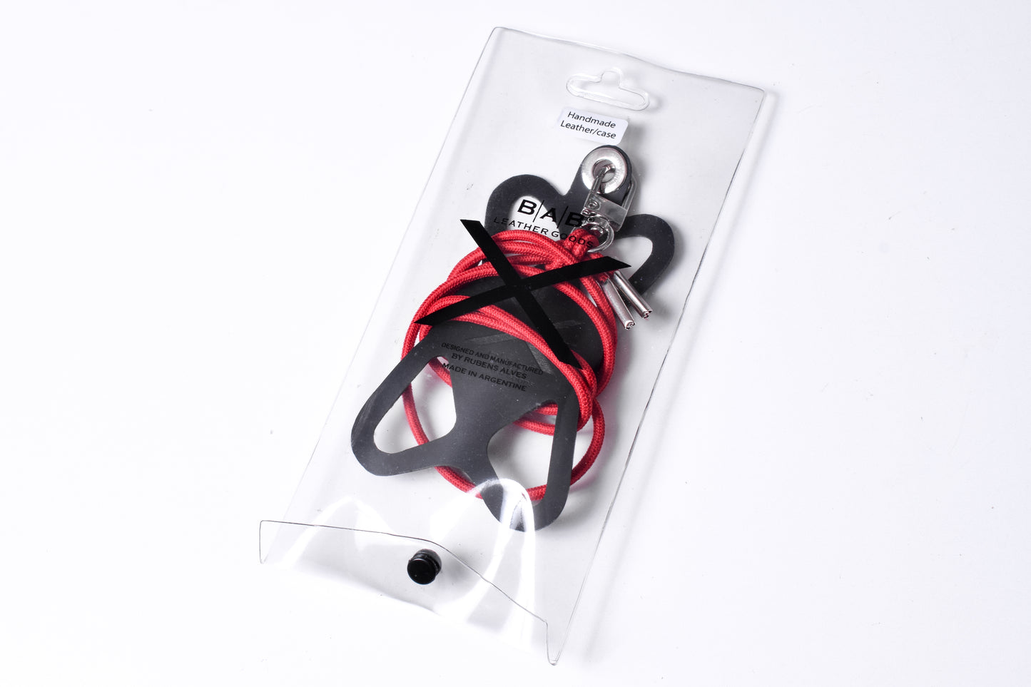 Suporte para celular de Silicone gravado a laser. Crossbody/Colar/Pulseira de Corda Elástica, Multicolorido, Preto ou Vermelho com 1 Mosquetão giratório, 1 Ilhó e 2 Terminais prateados.- S27