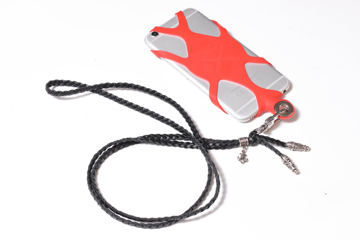 Laser-engraved Silicone cell phone Holder. 2 Spiral Terminals, 1 Spiral Pin with Ring, and 1 Fleur-de-Lys Pendant, all made of 925 Sterling Silver & Crossbody/Necklace/Bracelet with 3 hand-braided double strands, Brown, or Black.- SP45