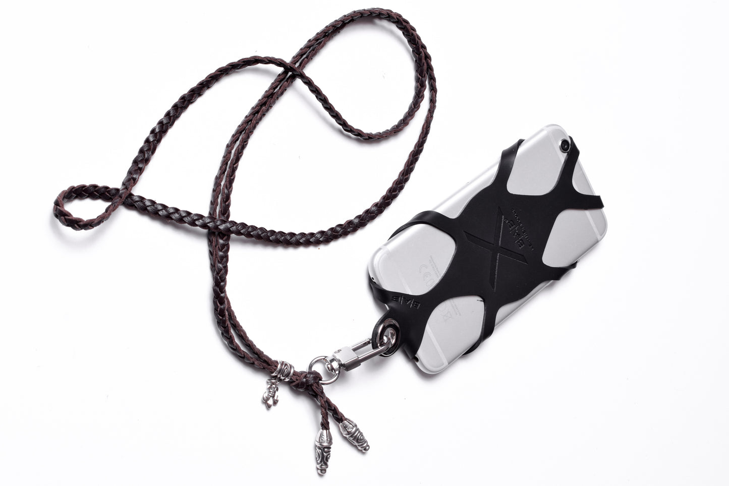Laser-engraved Silicone cell phone Holder. 2 Spiral Terminals, 1 Spiral Pin with Ring, and 1 Fleur-de-Lys Pendant, all made of 925 Sterling Silver & Crossbody/Necklace/Bracelet with 3 hand-braided double strands, Brown, or Black.- SP45