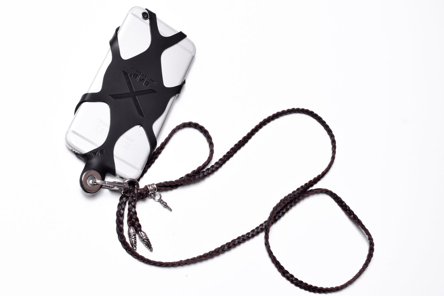 Laser-engraved Silicone cell phone Holder. 2 Spiral Terminals, 1 Spiral Pin with Ring, and 1 Dagger Pendant, all made of solid 925 Sterling Silver & Genuine Leather Crossbody/Necklace/Bracelet with 3 hand-braided double strands, Brown, or Black.- SP32