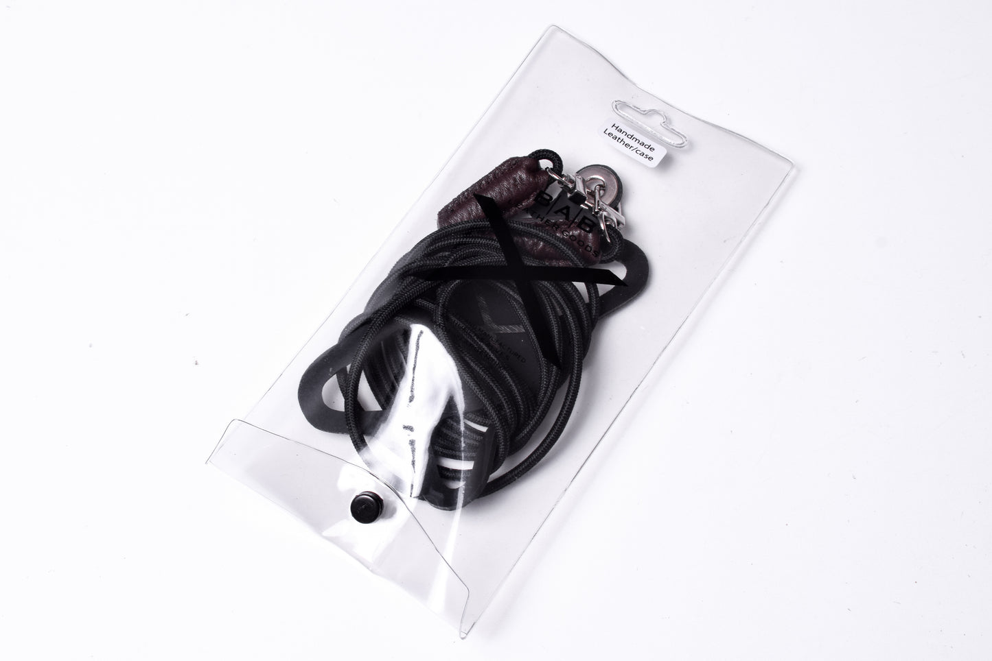 Soporte para celular de Silicona grabado con láser. Crossbody/Collar/Pulsera doble de Cuerda Elástica Negra & 2 Terminales de Cuero Full-Grain curtido vegetal al tanino, Azul, Marrón, Negro o Rojo con 2 Mosquetones plateados.- S23