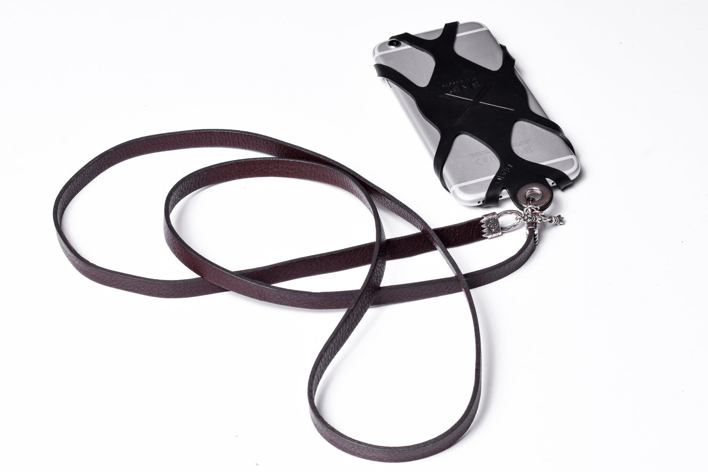 Laser-engraved Silicone cell phone Holder. 2 Cape Terminals, 1 Cane, and S-Clasp, all made of Solid 925 Sterling Silver & Crossbody/Necklace/Bracelet in double Full-Grain vegetable-tanned Leather, Blue, Brown, Black, or Red.- SP25