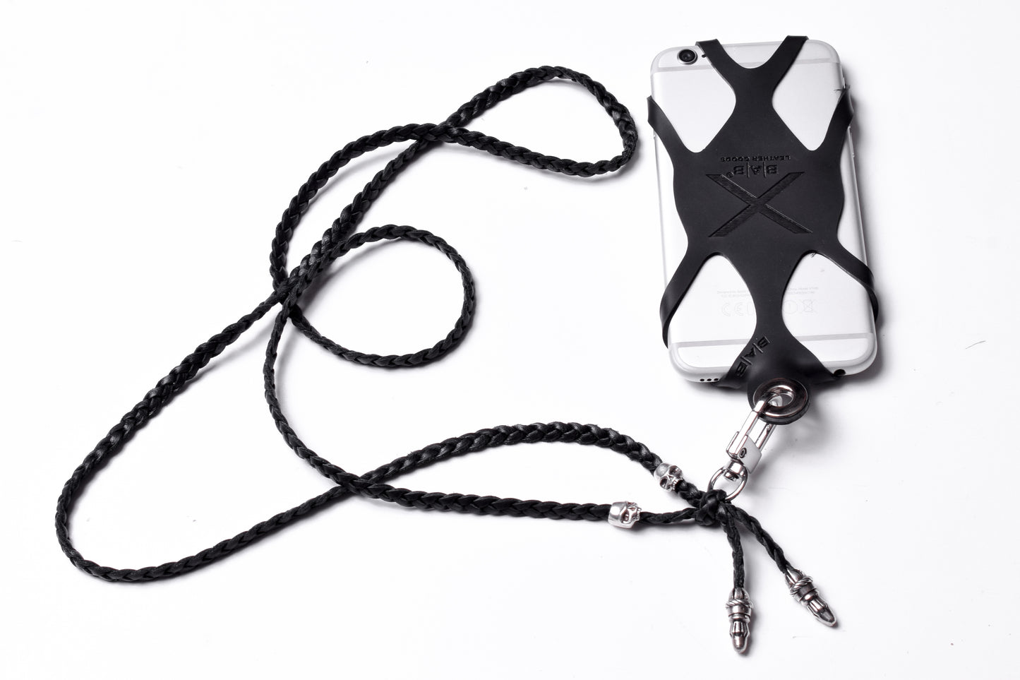 Laser-engraved Silicone cell phone Holder. 2 Skulls and 2 Rope Terminals, all made of solid 925 Sterling Silver & Genuine Leather Crossbody/Necklace/Bracelet with 3 hand-braided double strands, Brown, or Black.- SP30