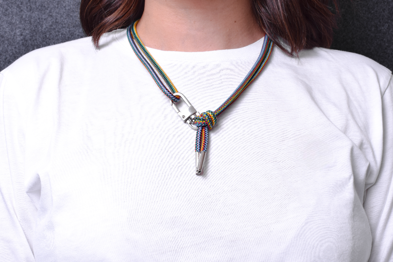 Laser-engraved Silicone cell phone Holder. Elastic Rope Crossbody/Necklace/Bracelet, Multicolor / Black / Red with 1 swivel Carabiner, 1 Eyelet, and 2 Silver-plated End caps.- S27