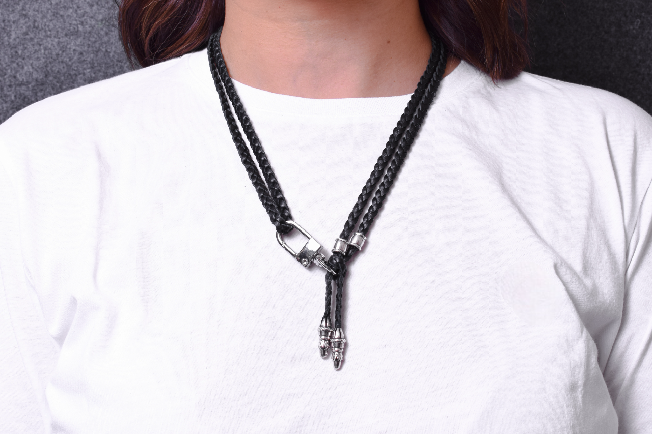 Laser-engraved Silicone cell phone Holder. 2 Rope Terminals and 2 Rope Pins, all made of solid 925 Sterling Silver & Genuine Leather Crossbody/Necklace/Bracelet with 3 hand-braided double strands, Brown, or Black.- SP42