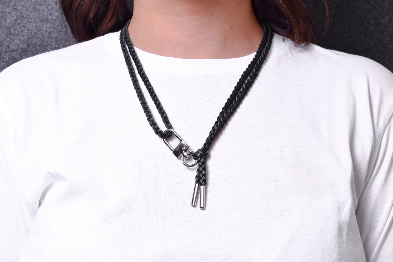 Laser engraved Silicone cell phone Holder. Genuine Leather Crossbody/Necklace/Bracelet with 3 double hand braided strands, Brown, or Black with 1 swivel Carabiner, and 2 Silver-plated End caps.- SC38