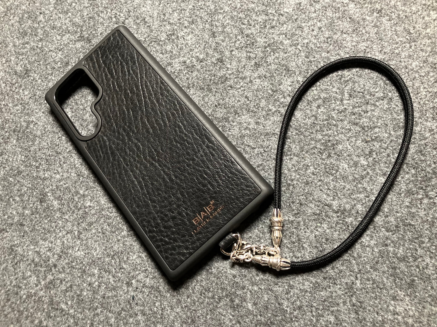 Full-Grain vegetable-tanned Genuine Leather Case/Holder for iPhone/Samsung/microfiber. 2 Rope Ends, 2 Links, and 6 Rings, all made of 925 Sterling Silver & Black Elastic Rope Strap/Choker/Bracelet.- KP40