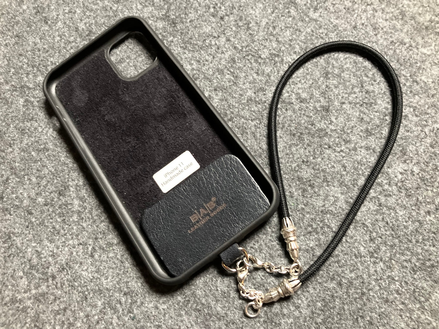 Full-Grain vegetable-tanned Genuine Leather Case/Holder for iPhone/Samsung/microfiber. 2 Rope Ends, 2 Links, and 6 Rings, all made of 925 Sterling Silver & Black Elastic Rope Strap/Choker/Bracelet.- KP40