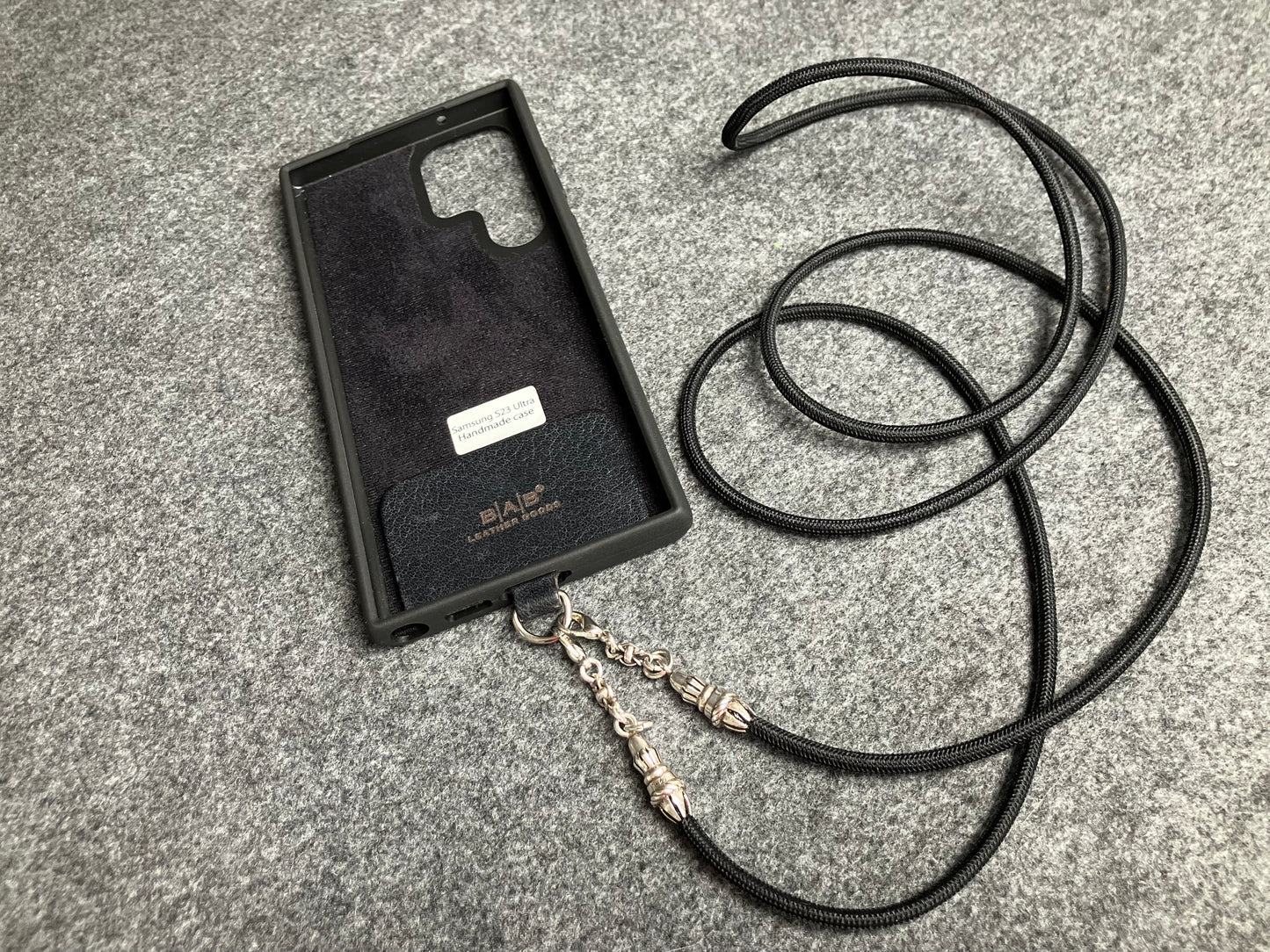 Full-Grain vegetable-tanned Genuine Leather Case/Holder for iPhone/Samsung/microfiber. 2 Rope Terminals, 2 Links, and 6 Rings, all made of 925 Sterling Silver & Crossbody/Necklace/Choker/Bracelet with Black Elastic Rope.- KC29