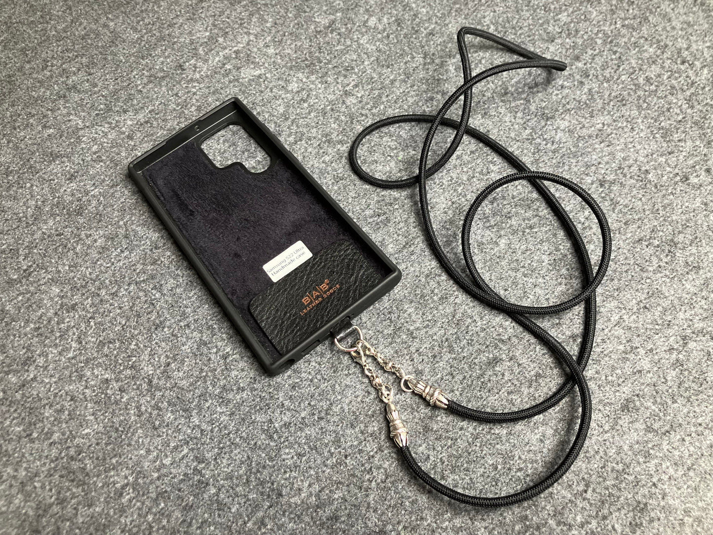 Full-Grain vegetable-tanned Genuine Leather Case/Holder for iPhone/Samsung/microfiber. 2 Rope Terminals, 2 Links, and 6 Rings, all made of 925 Sterling Silver & Crossbody/Necklace/Choker/Bracelet with Black Elastic Rope.- KC29