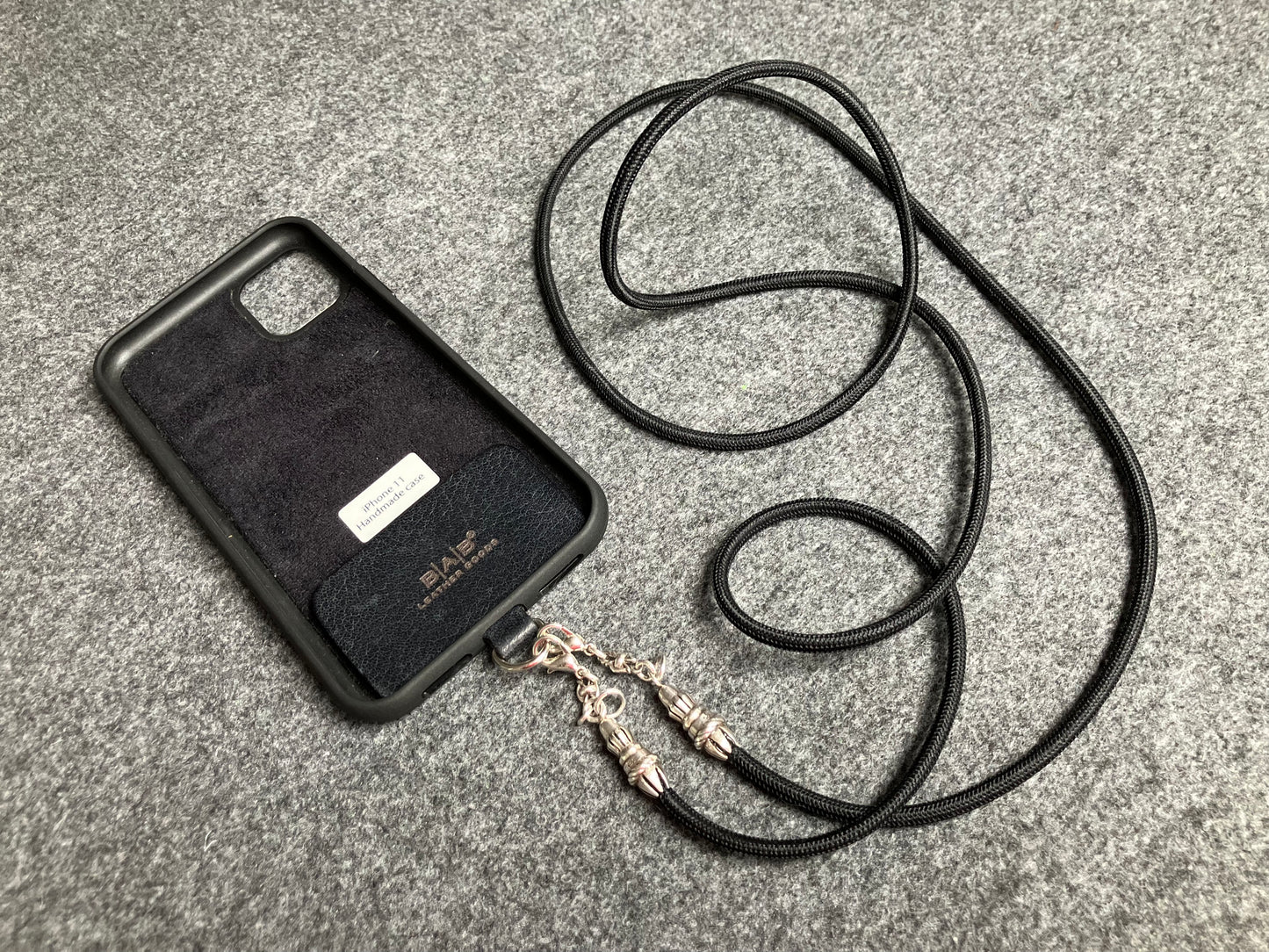 Full-Grain vegetable-tanned Genuine Leather Case/Holder for iPhone/Samsung/microfiber. 2 Rope Terminals, 2 Links, and 6 Rings, all made of 925 Sterling Silver & Crossbody/Necklace/Choker/Bracelet with Black Elastic Rope.- KC29
