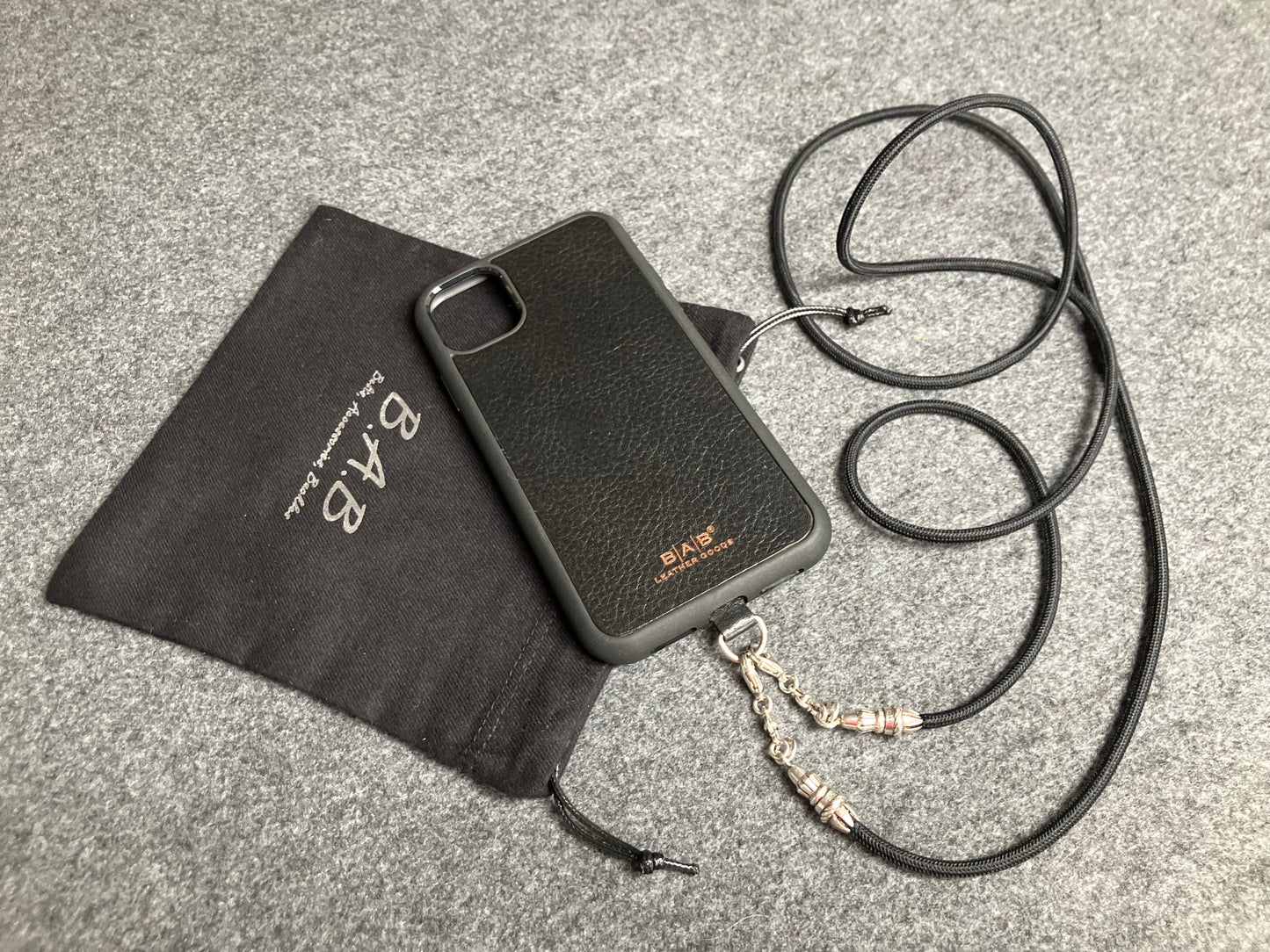 Full-Grain vegetable-tanned Genuine Leather Case/Holder for iPhone/Samsung/microfiber. 2 Rope Terminals, 2 Links, and 6 Rings, all made of 925 Sterling Silver & Crossbody/Necklace/Choker/Bracelet with Black Elastic Rope.- KC29