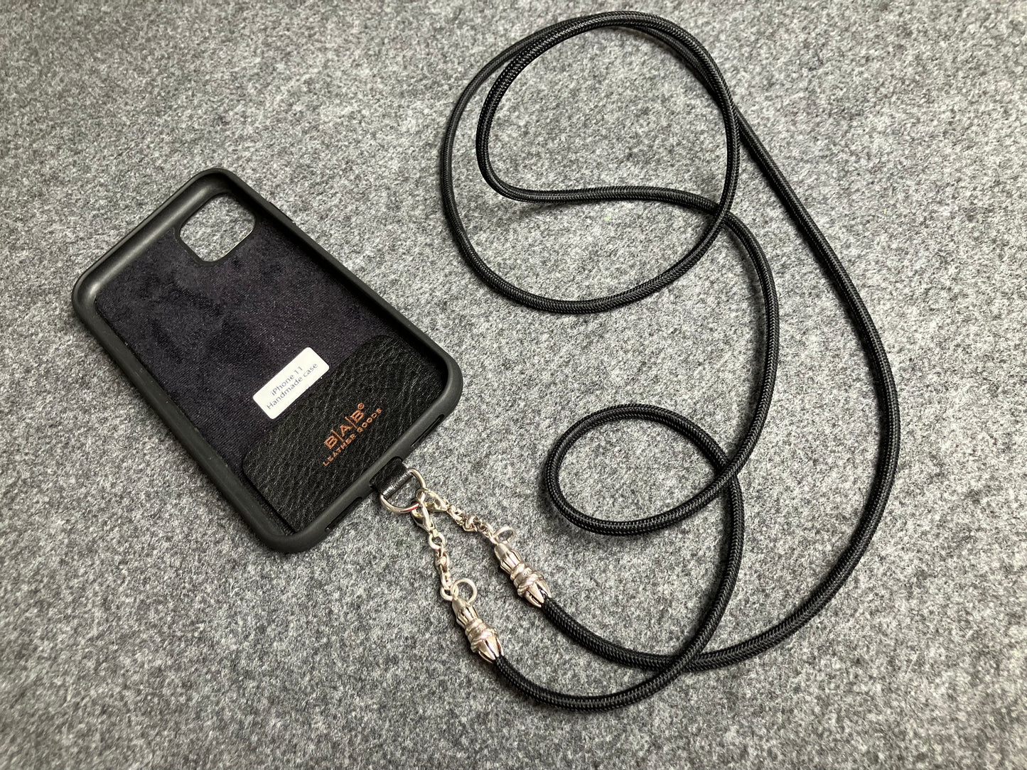 Full-Grain vegetable-tanned Genuine Leather Case/Holder for iPhone/Samsung/microfiber. 2 Rope Terminals, 2 Links, and 6 Rings, all made of 925 Sterling Silver & Crossbody/Necklace/Choker/Bracelet with Black Elastic Rope.- KC29