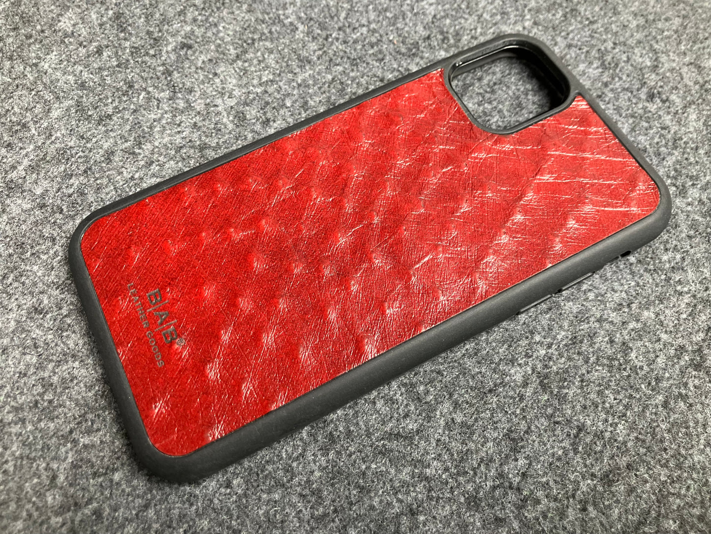 Funda de Cuero Genuino Baby Ostrich para iPhone/Samsung cortada & grabada con láser/microfibra.- 58