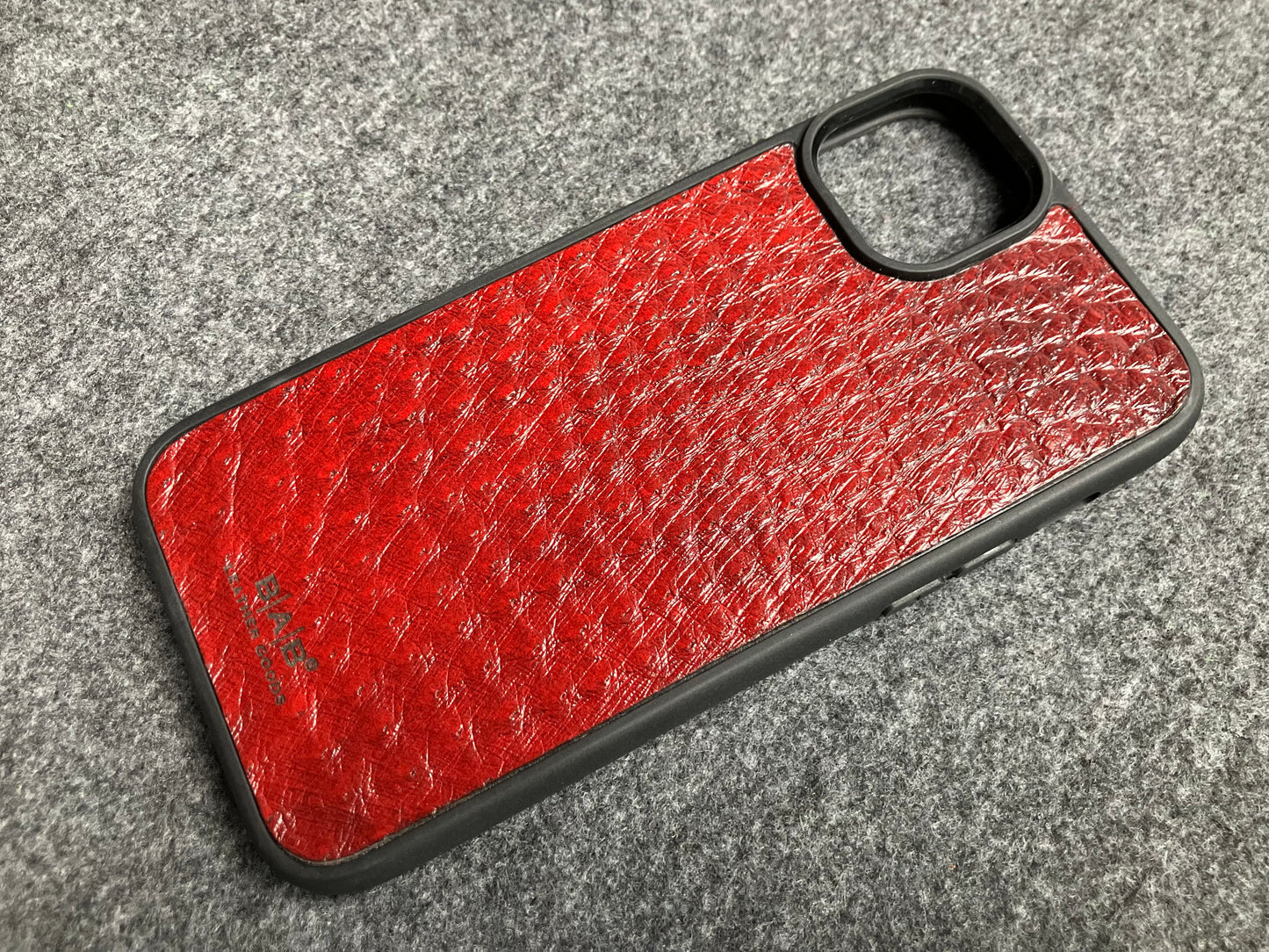Funda de Cuero Genuino Baby Ostrich para iPhone/Samsung cortada & grabada con láser/microfibra.- 58
