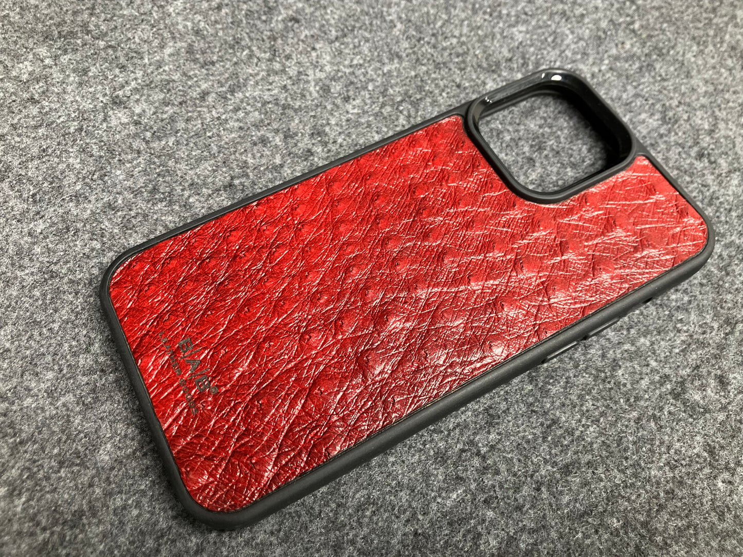Funda de Cuero Genuino Baby Ostrich para iPhone/Samsung cortada & grabada con láser/microfibra.- 58