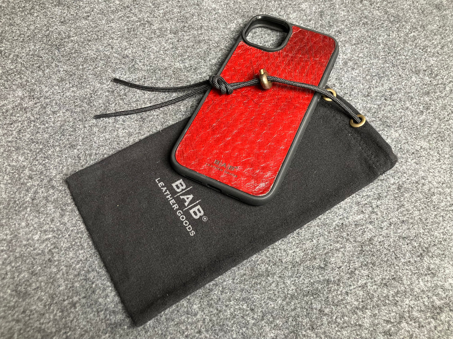 Funda de Cuero Genuino Baby Ostrich para iPhone/Samsung cortada & grabada con láser/microfibra.- 58