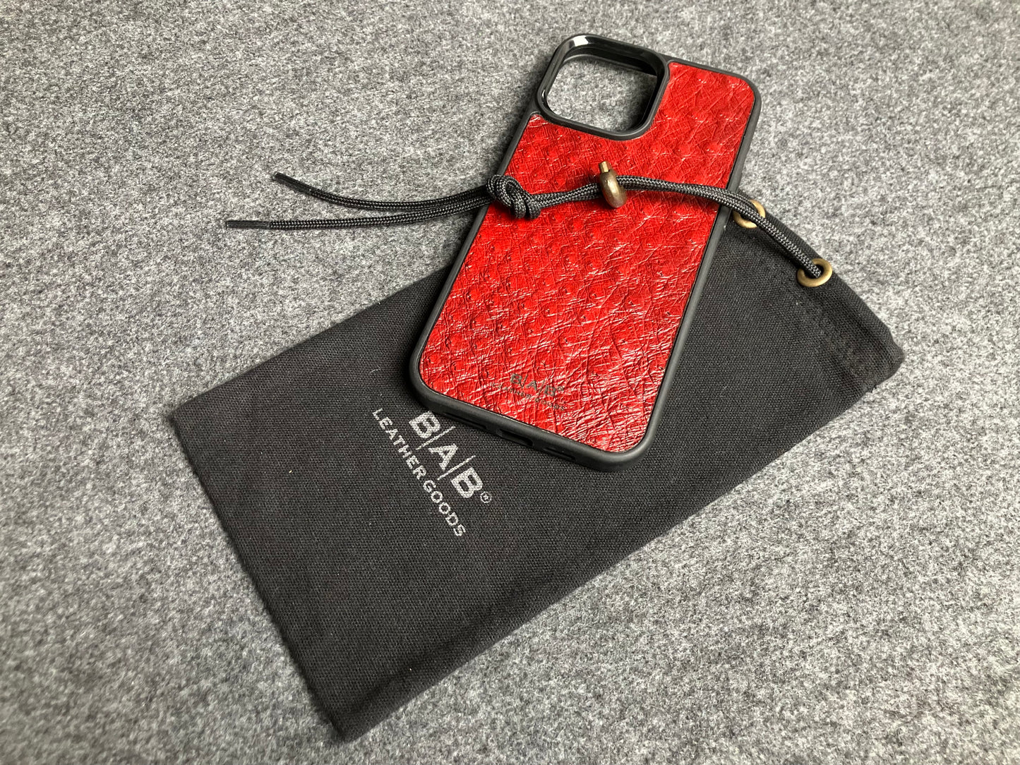 Funda de Cuero Genuino Baby Ostrich para iPhone/Samsung cortada & grabada con láser/microfibra.- 58