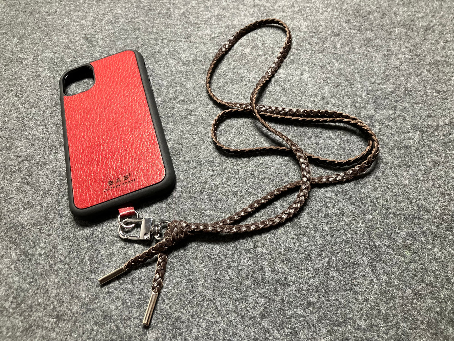 Genuine Leather Crossbody/Necklace/Bracelet, with three double hand-braided Strands, Brown or Black. 1 swivel Carabiner and 2 End caps, all Silver.- C38