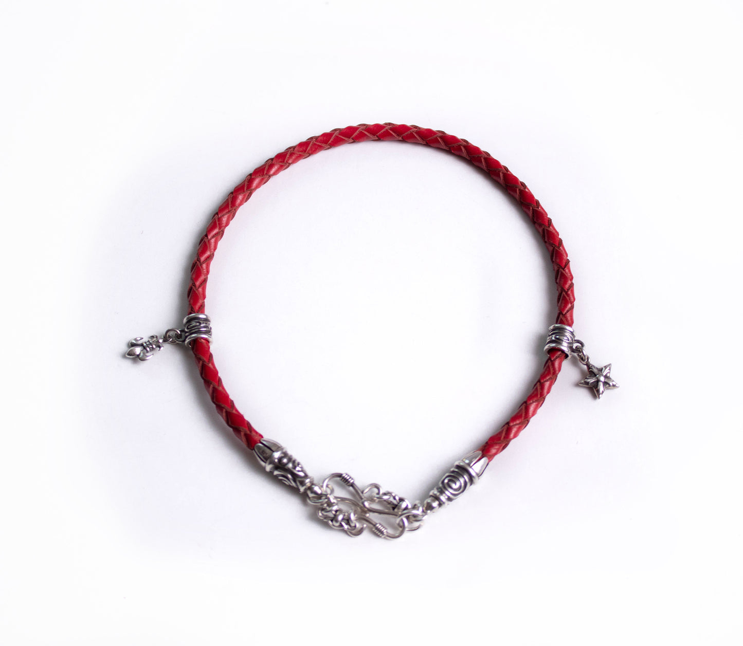 2 Spiral Terminals, 2 Links, 2 S-Clasps, 2 Pendant Pins, and 8 Rings, all made of solid 925 Sterling Silver & Genuine Leather Strap/Choker/Bracelet with 4 hand-braided strands.- PP02