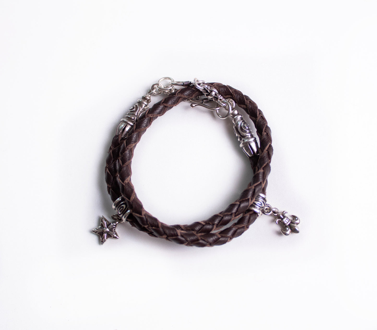 2 Spiral Terminals, 2 Links, 2 S-Clasps, 2 Pendant Pins, and 8 Rings, all made of solid 925 Sterling Silver & Genuine Leather Strap/Choker/Bracelet with 4 hand-braided strands.- PP02