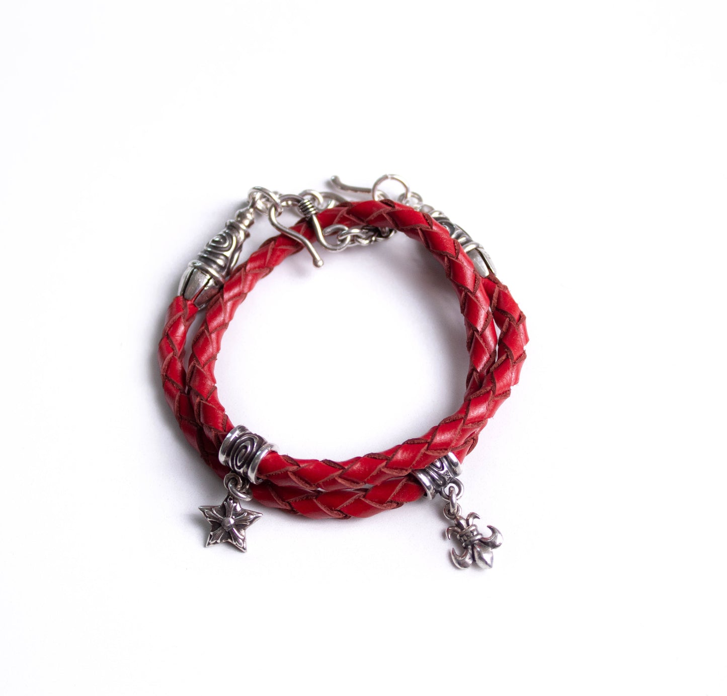 2 Spiral Terminals, 2 Links, 2 S-Clasps, 2 Pendant Pins, and 8 Rings, all made of solid 925 Sterling Silver & Genuine Leather Strap/Choker/Bracelet with 4 hand-braided strands.- PP02